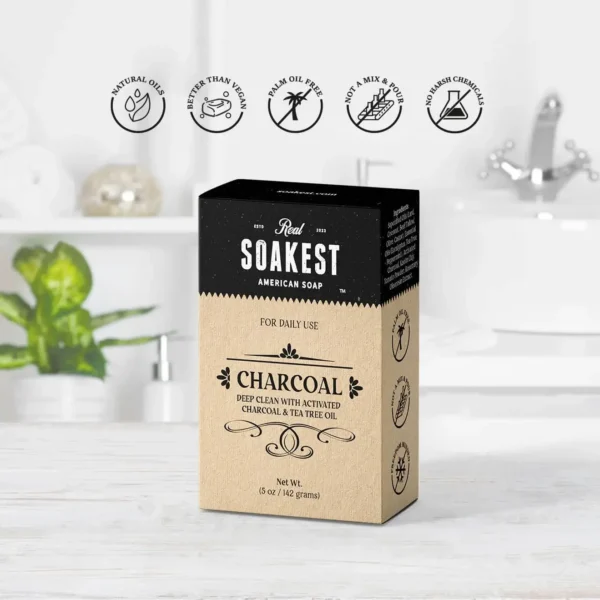 A bar soap box of scented charcoal soap pictured in a bathroom setting